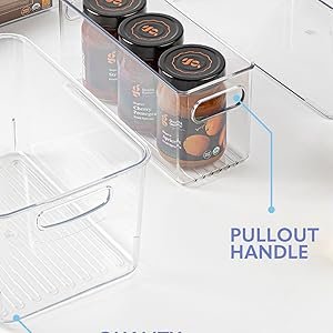 clear plastic storage bins with handles holding olive oil and jars